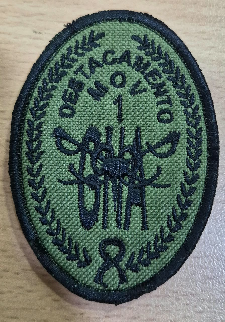 EMBLEMA DEL DESTACAMENTO MOVIL 1 BAJA VISIBILIDAD