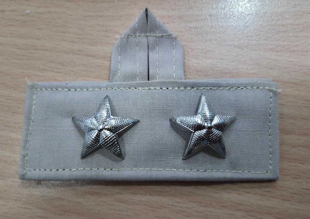 JERARQUIA PECTORAL COLGANTE GRIS ARENA OFICIAL